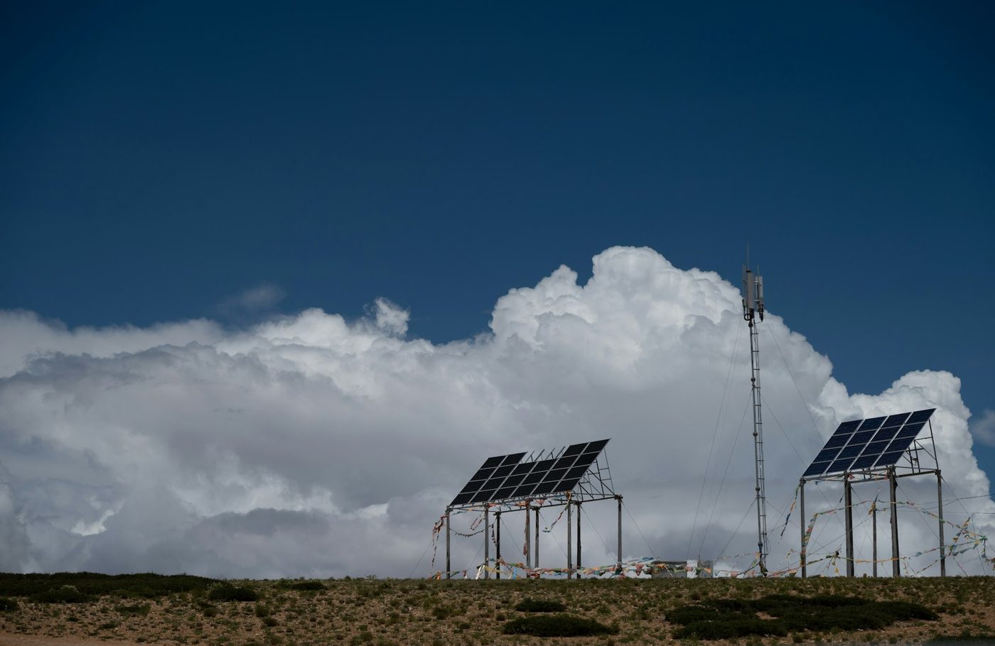 Solar array powering a remote communications tower in the mountains